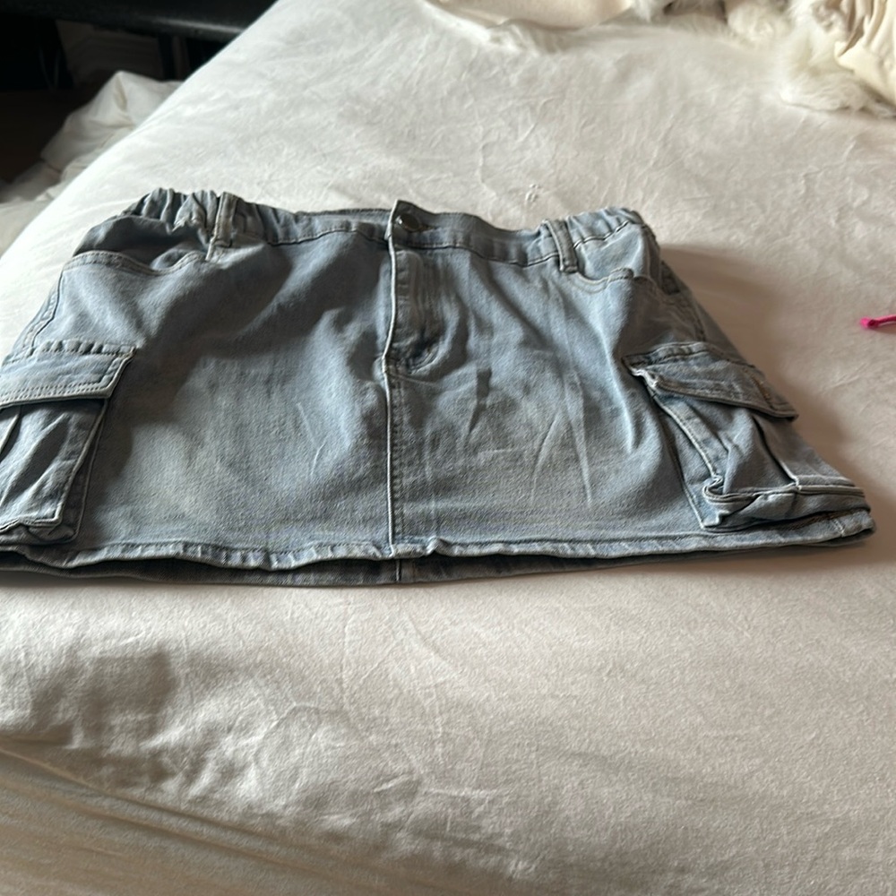 Cargo blue mini skirt with zip up fly.